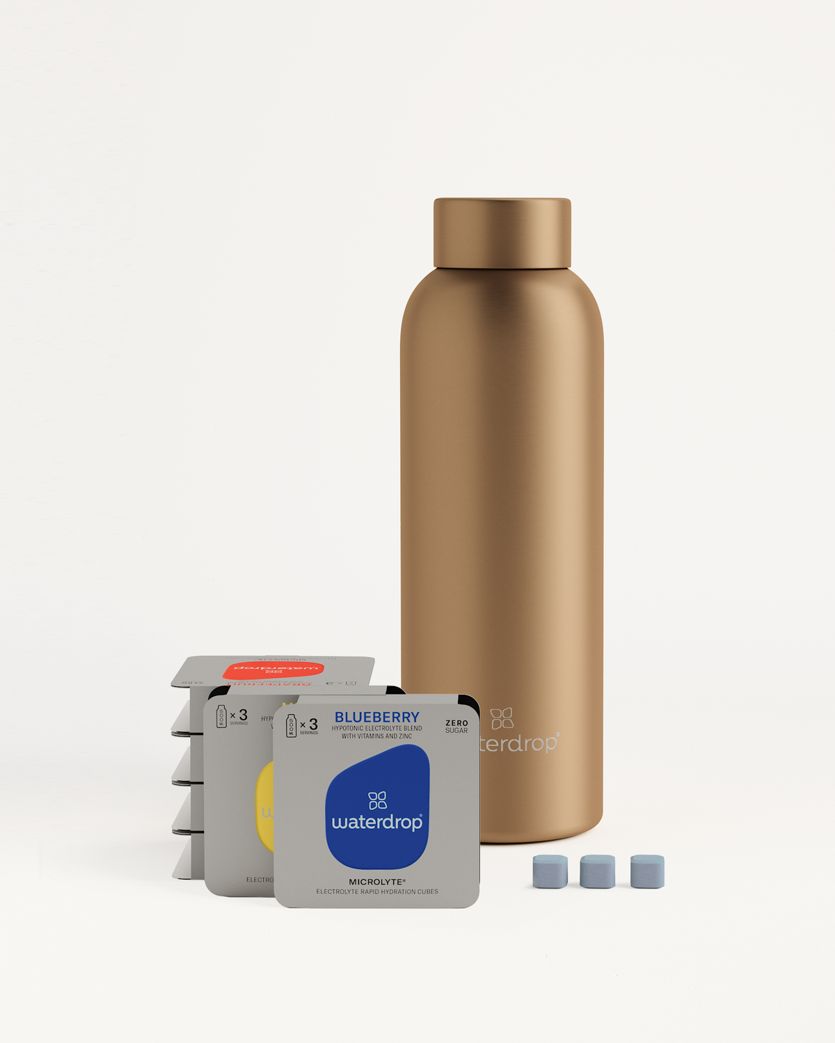 Starter Set Microlyte Thermo Steel featuring a brown Thermo Steel bottle and three Microlyte flavor packages: Blueberry, Grapefruit, and Melon.