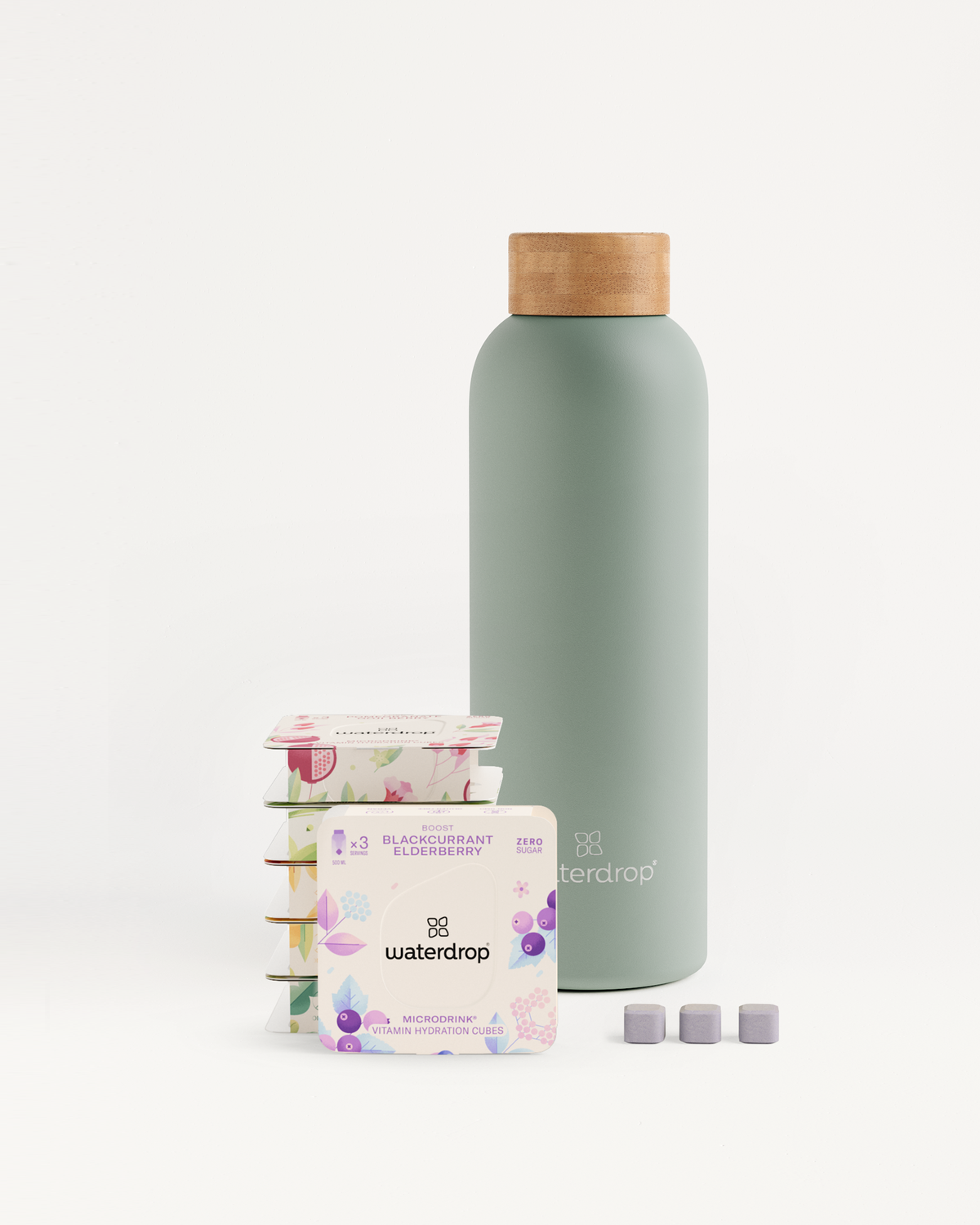 Starter Set Microdrink Thermo Steel featuring a stainless steel bottle and packs of flavored water cubes.