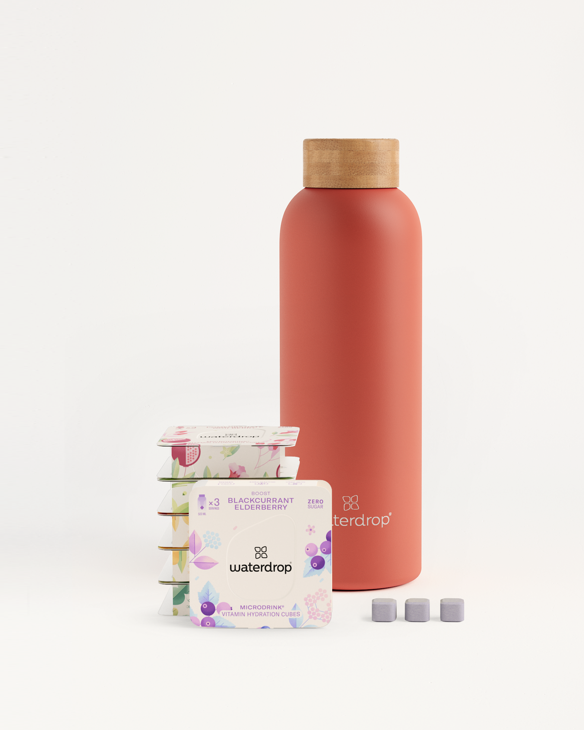 Starter Set Microdrink Thermo Steel featuring a stainless steel bottle (600ml) and six 3-packs of flavored water cubes.