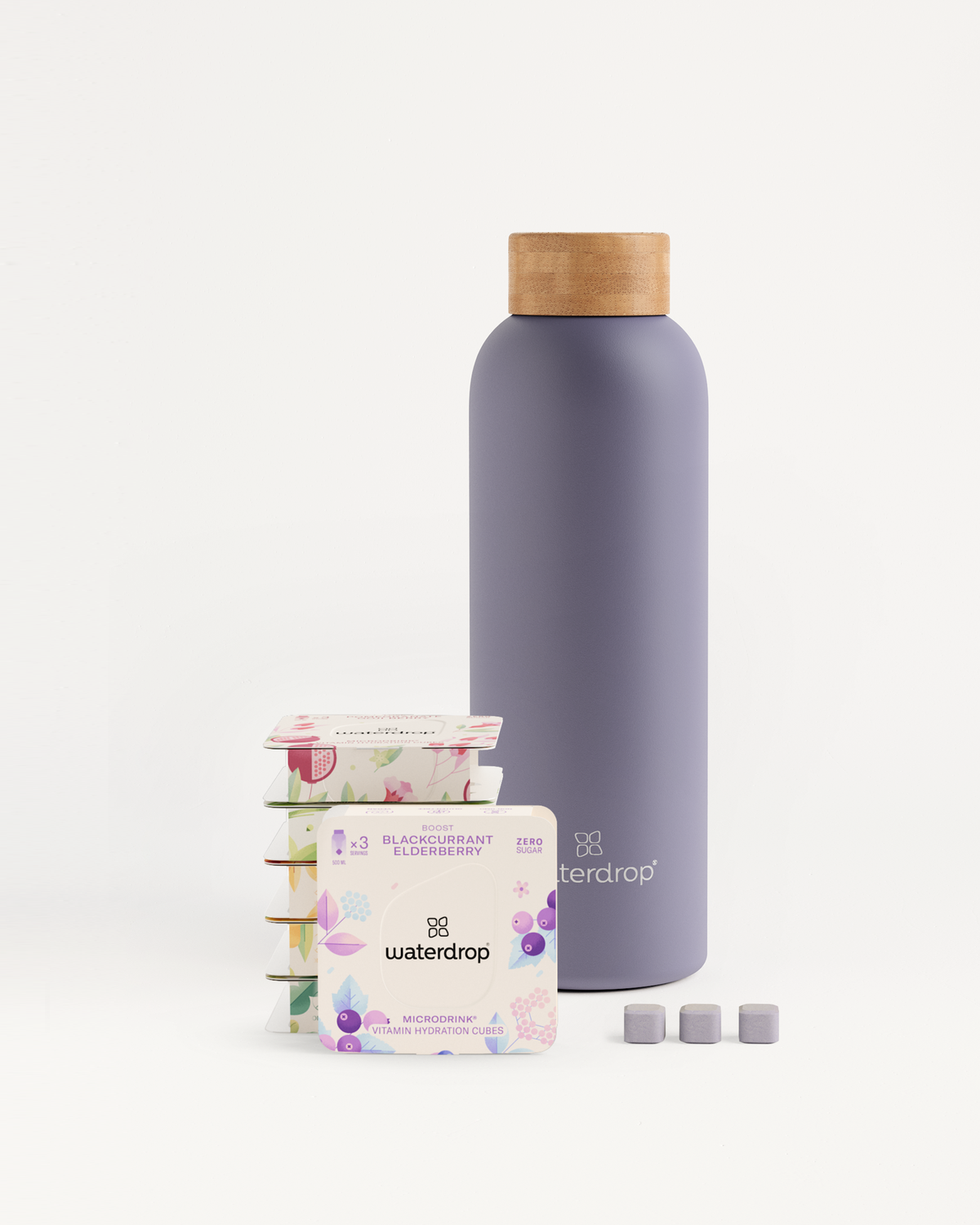 Starter Set Microdrink Thermo Steel: A stainless steel thermo bottle (600ml) alongside six 3-packs of various Microdrink flavors.