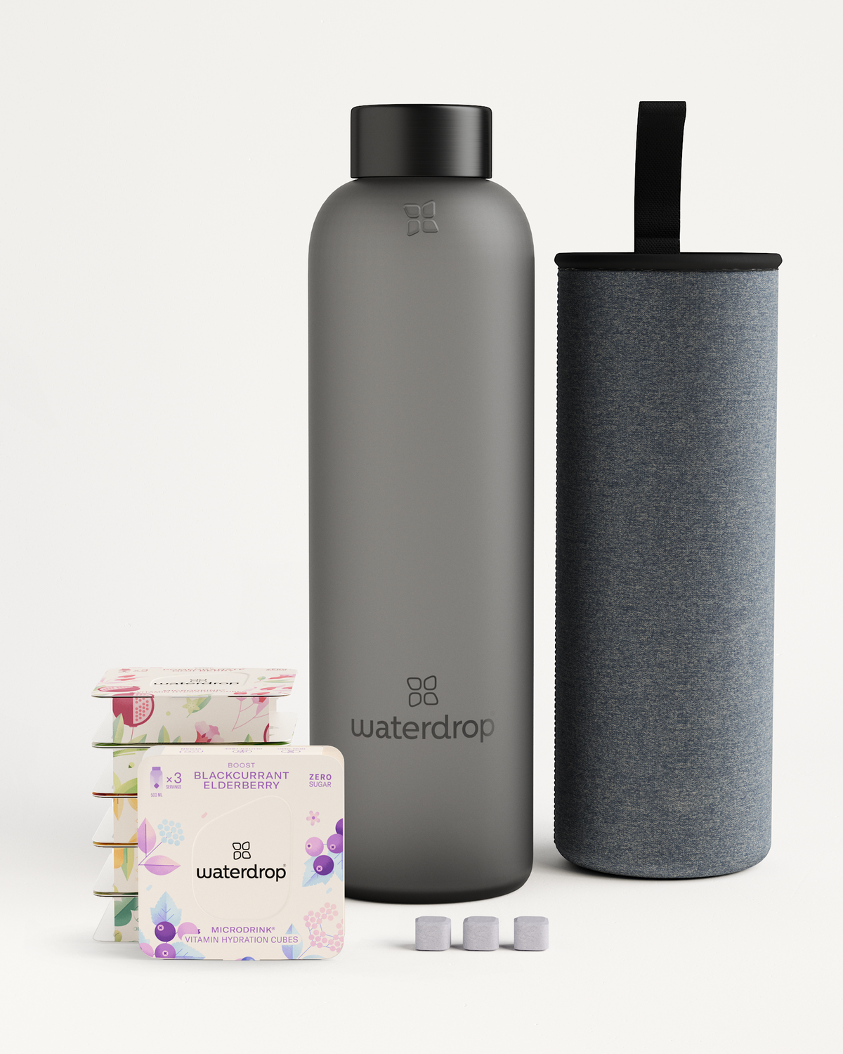 Starter Set Microdrink Glass featuring a grey Borosilicate Glass Bottle and a case, perfect for sampling six Microdrink flavors in convenient 3-Packs.