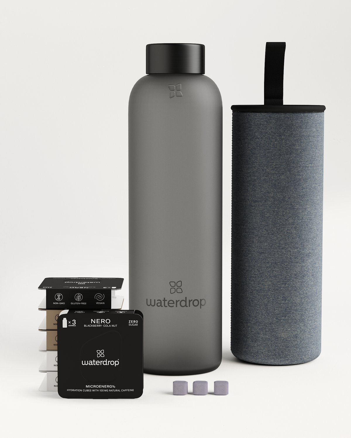 Starter Set Microenergy Glass featuring a grey water bottle and a matching case, alongside a black box with white text.