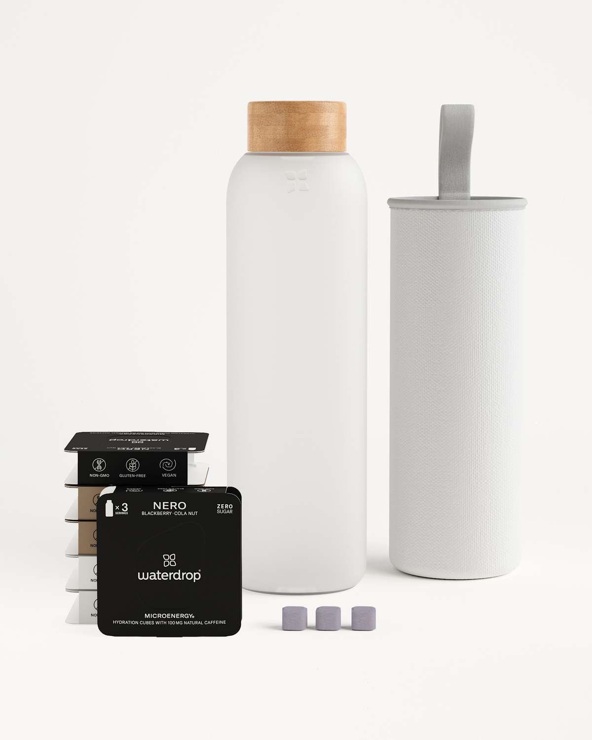 Microenergy Starter Set featuring a white bottle, white filter, and black box with white text. Contains 80-100mg caffeine per serving for a quick energy boost.