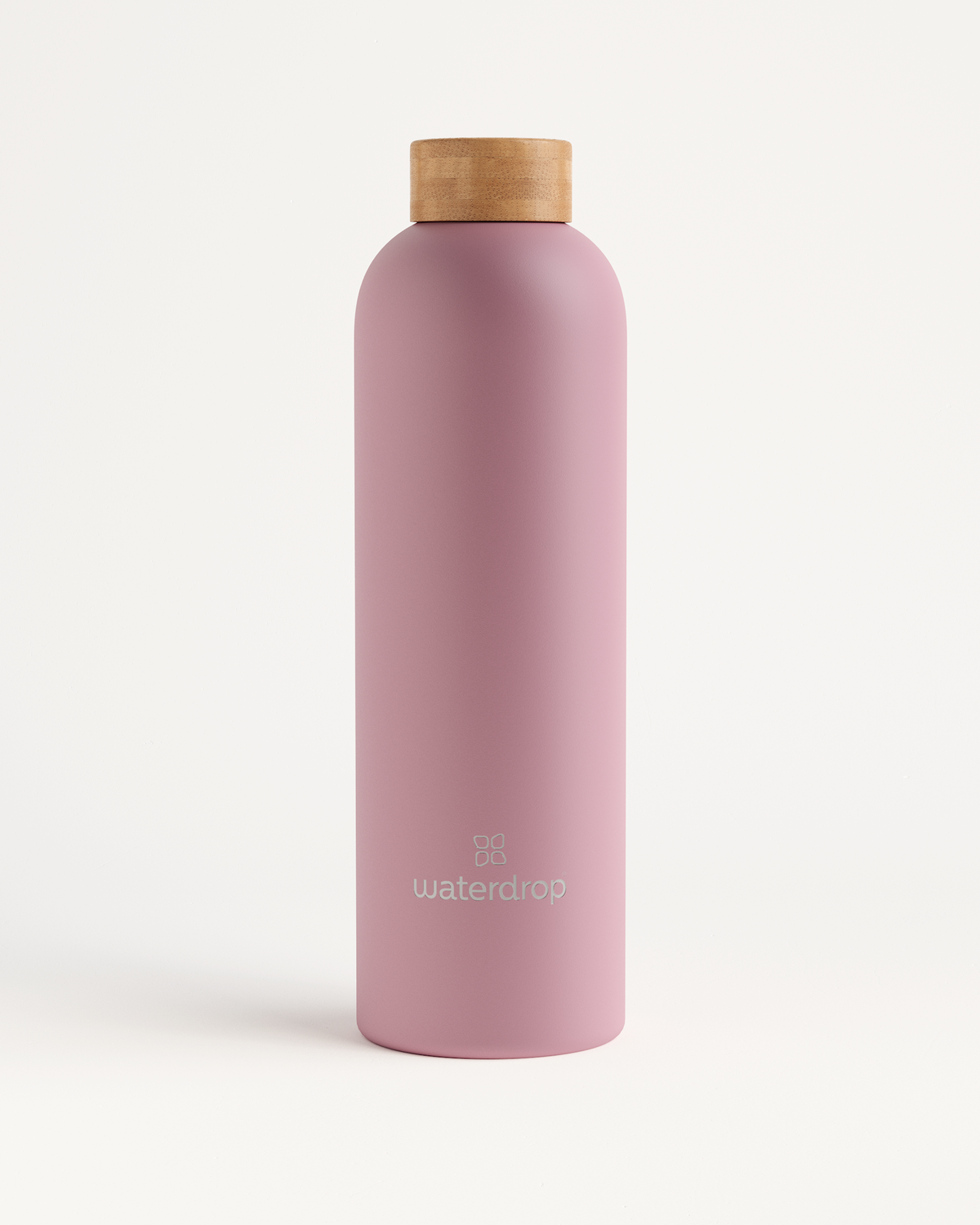 Thermo Steel bottle with a wooden cap, designed to keep drinks cold for 24 hours or hot for 12 hours, available in 400ml, 600ml, or 1L sizes.