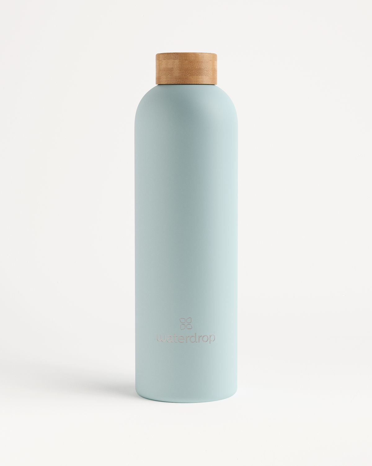 White Thermo Steel bottle with a brown cap, made of double-walled stainless steel, designed to keep beverages cold for 24 hours or hot for 12 hours.