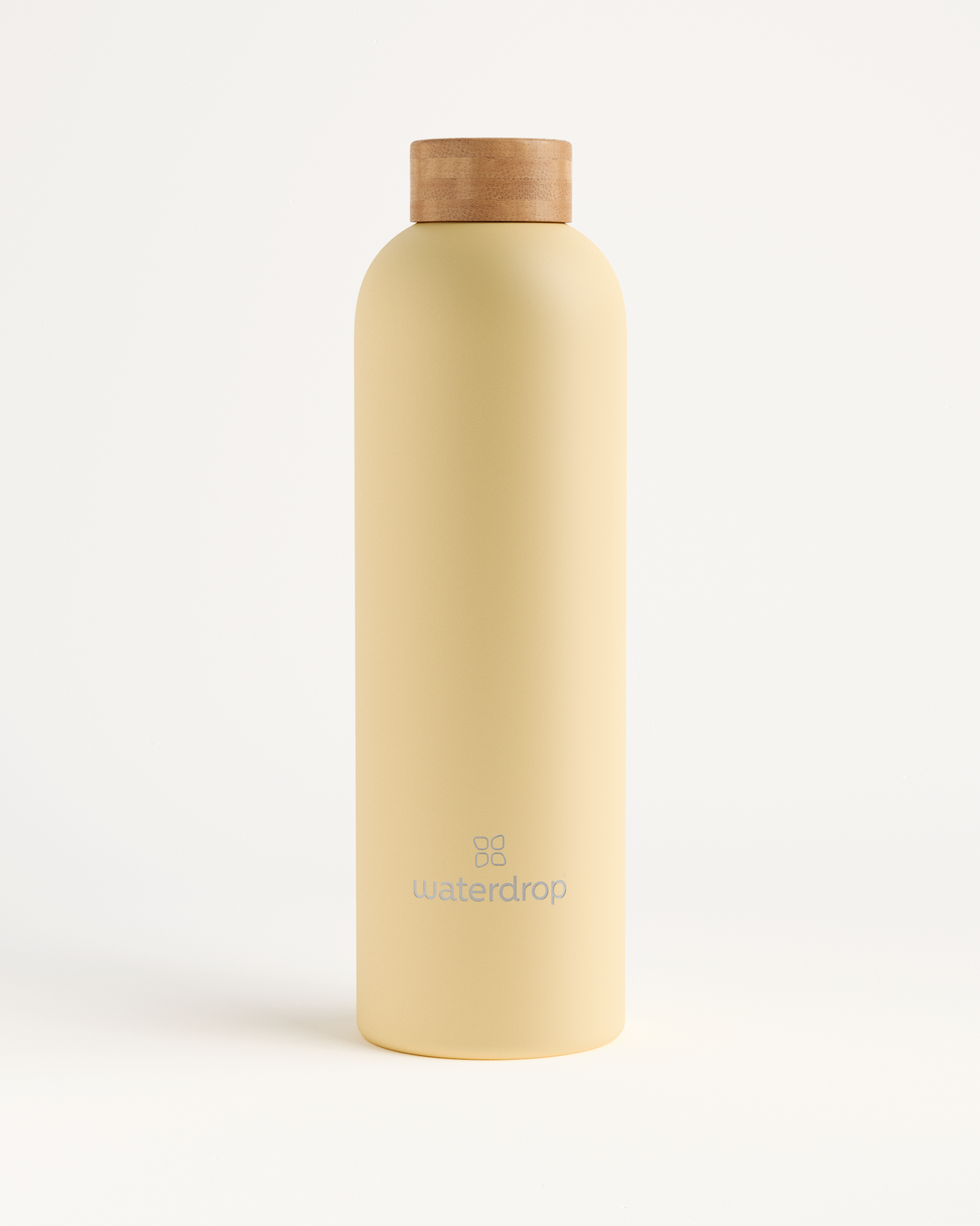 Thermo Steel bottle with cork top, double-walled stainless steel, visible logo, available in 400ml, 600ml, or 1L, keeps drinks cold for 24 hours or hot for 12 hours.