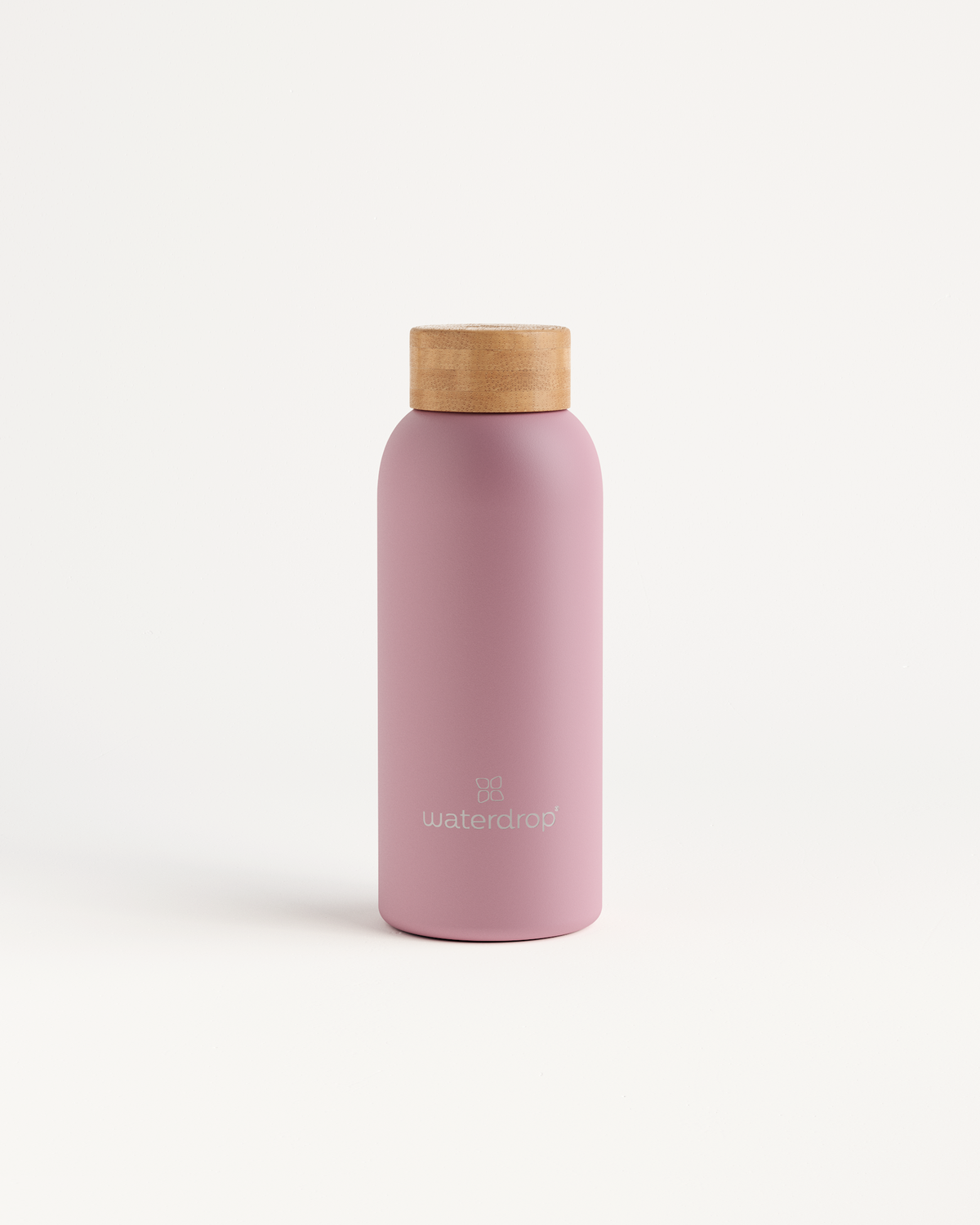 Thermo Steel bottle with a cork top, designed to keep drinks cold for 24 hours or hot for 12 hours. Available in 400ml, 600ml, or 1L sizes.