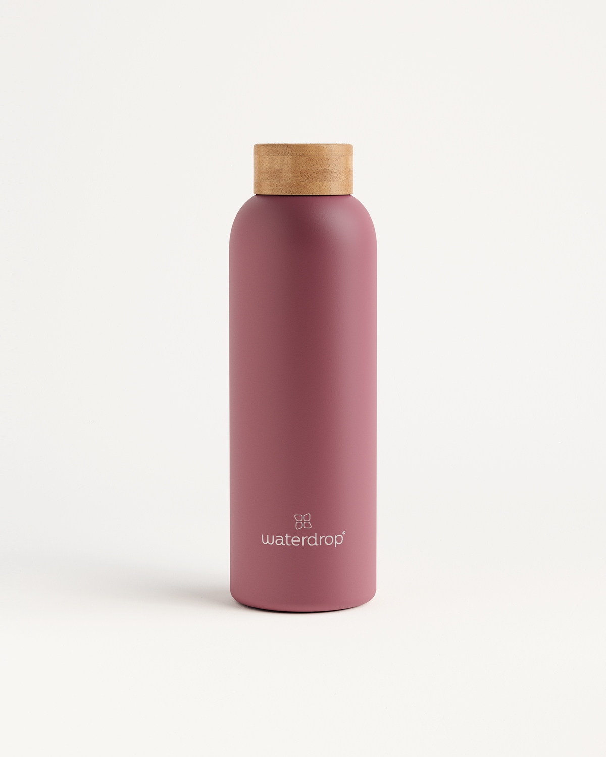 Thermo Steel bottle with a cork top, designed to keep drinks cold for 24 hours or hot for 12, available in 400ml, 600ml, or 1L.