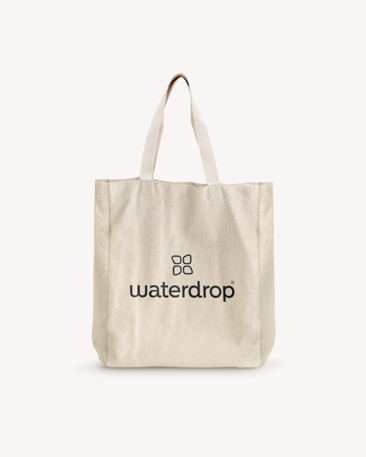 Shopping Bag with black text, featuring a white strap and metal ring, designed to carry waterdrop® products and more. Made of high-quality cotton for spacious on-the-go use.