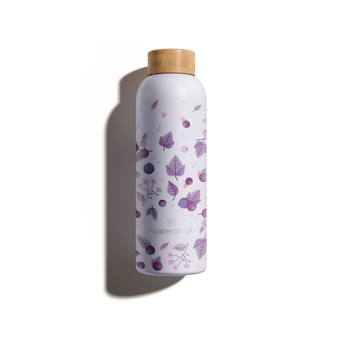 Edition Thermo Steel bottle with purple leaf design, double-walled stainless steel, keeps drinks cold for 24 hours or hot for 12 hours.